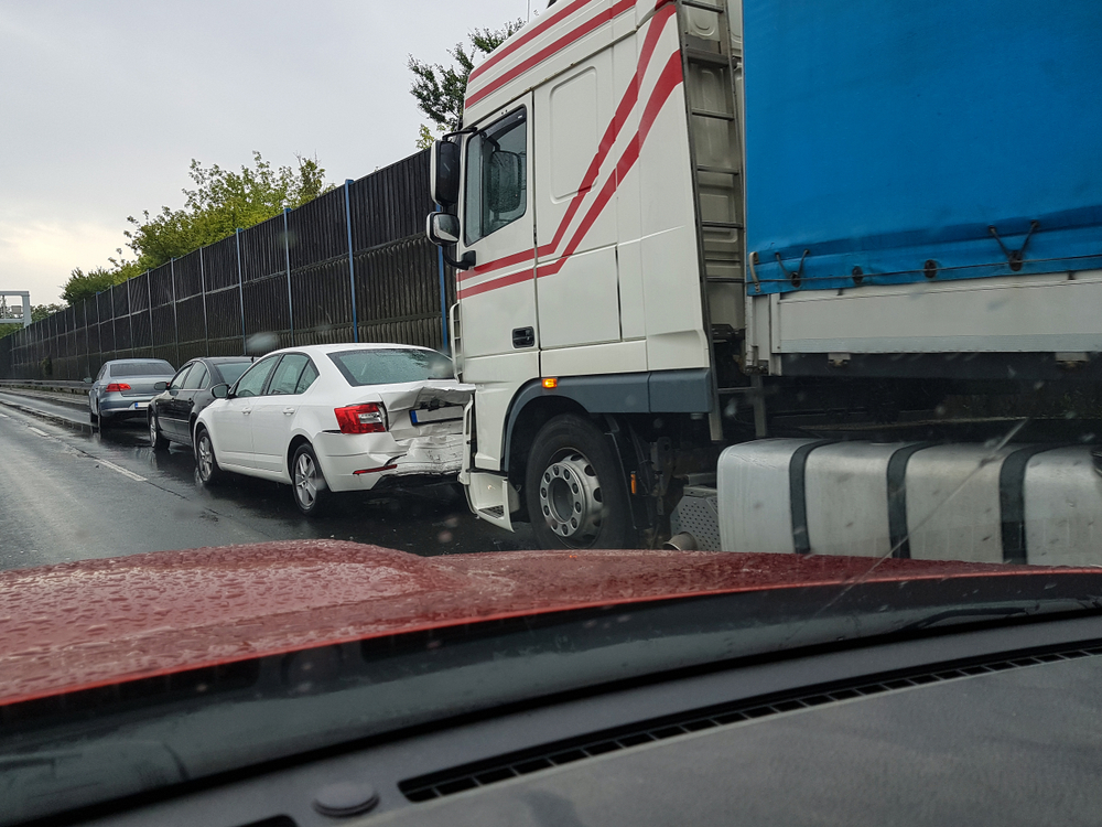 car,incident,on,highway,from,passing,car.,truck,hit,passenger
